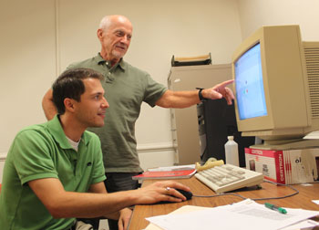 Prof. Breitmeyer and Shon infront of computer at a desk