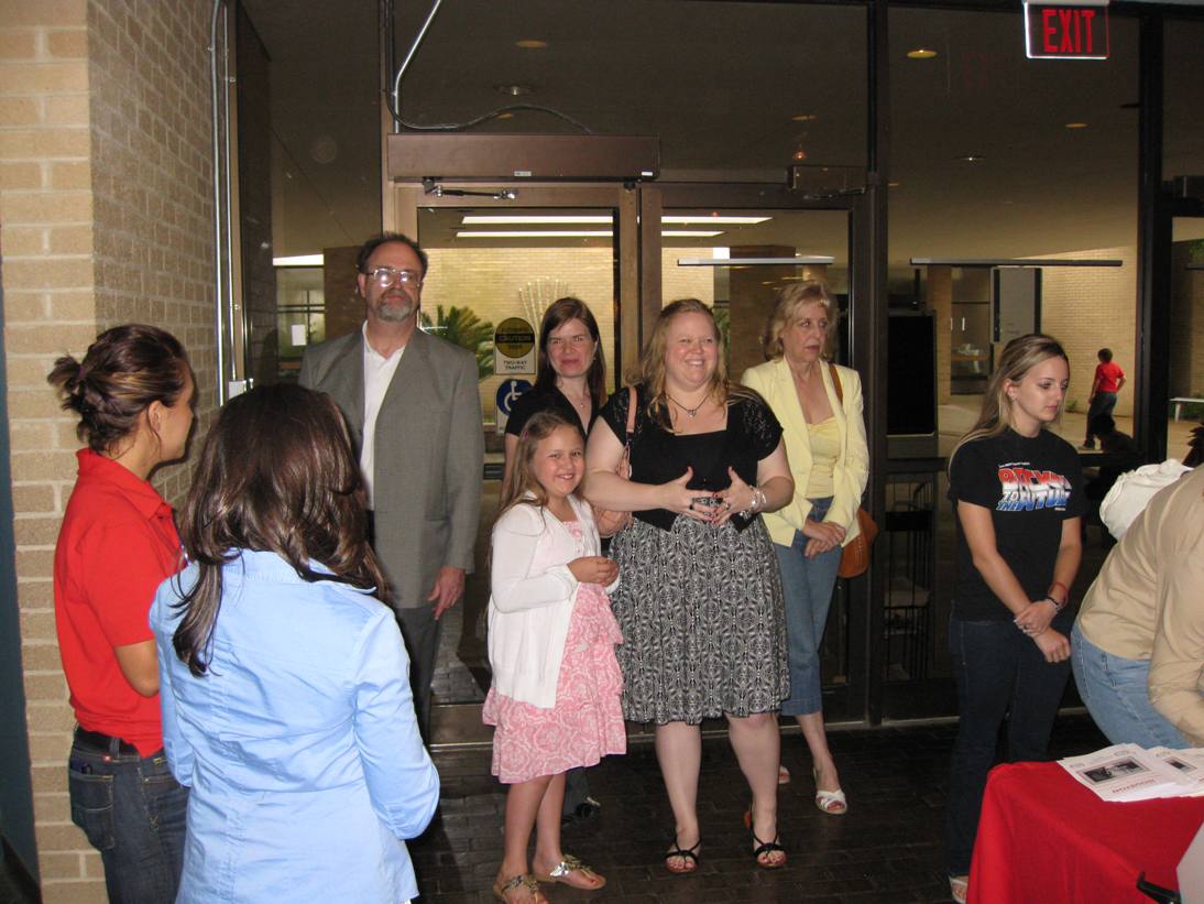 Guests are arriving to the screening of the movie