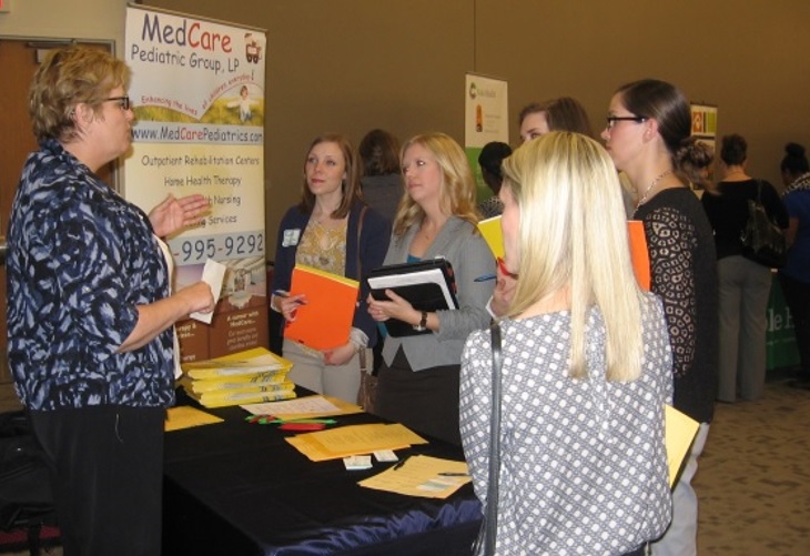 Prospective students and employers at the 2014 COMD job fair