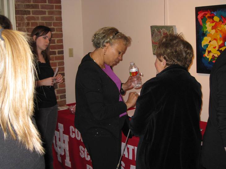 UH Audiologist, Jennifer Meeks consults with a participant