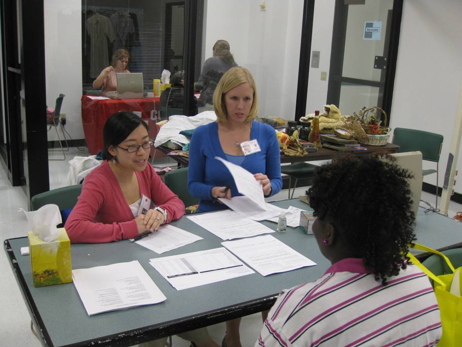 Graduate clinicians conducting screenings