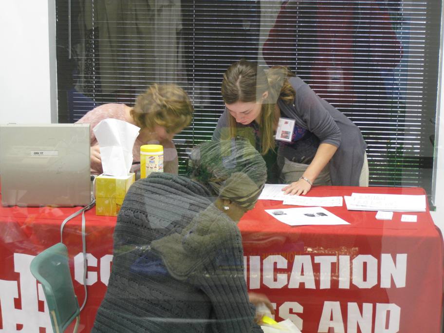 Graduate clinicians conducting screenings