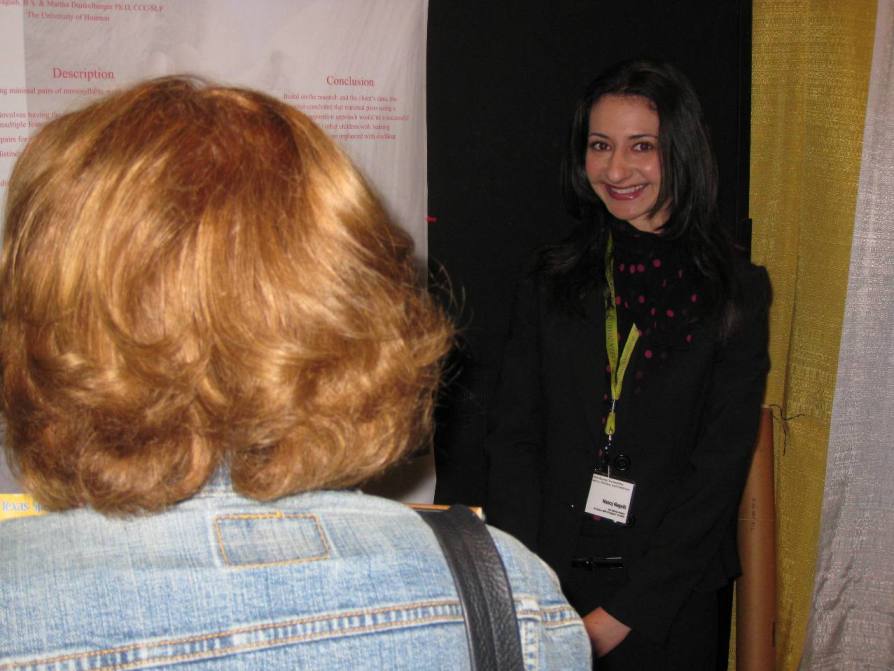 Graduate student Nancy Naguib presents