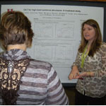 UH COMD graduate student, Courtney Paper presenting her co-authored poster