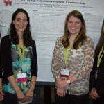 Graduate students Elizabeth Tatem, Margeux Rendall, Courtney Pape, and Amy Wasserman presenting their poster