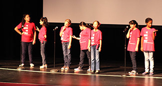 UH Charter School Students persforming a poem 