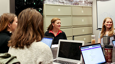 Assistant Professor Sarah Mire met in December with students on her autism research team.