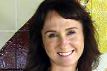 Alumna lives the life she teaches