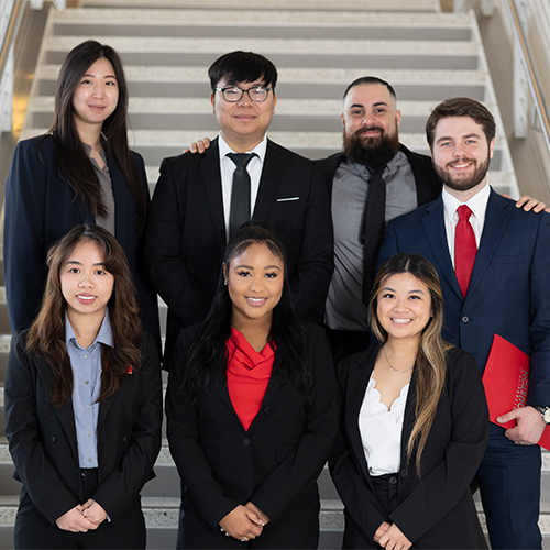 group of pharmacy students standing on stairs