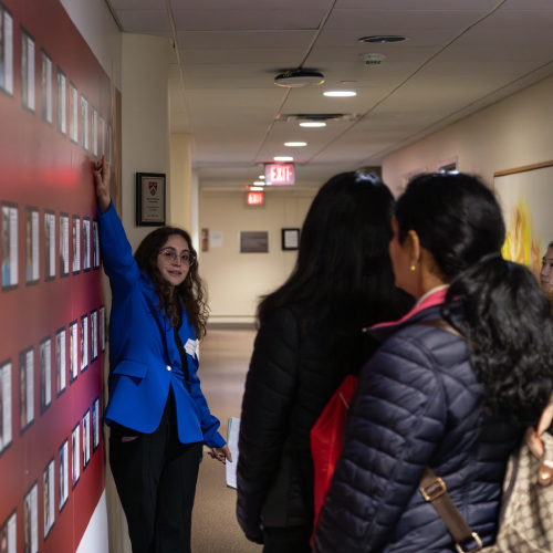 Uh student leading a tour