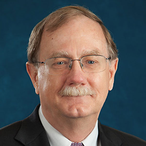 Dan E. Wells