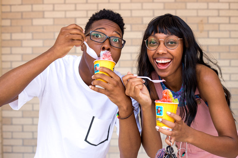 Students eating snocones
