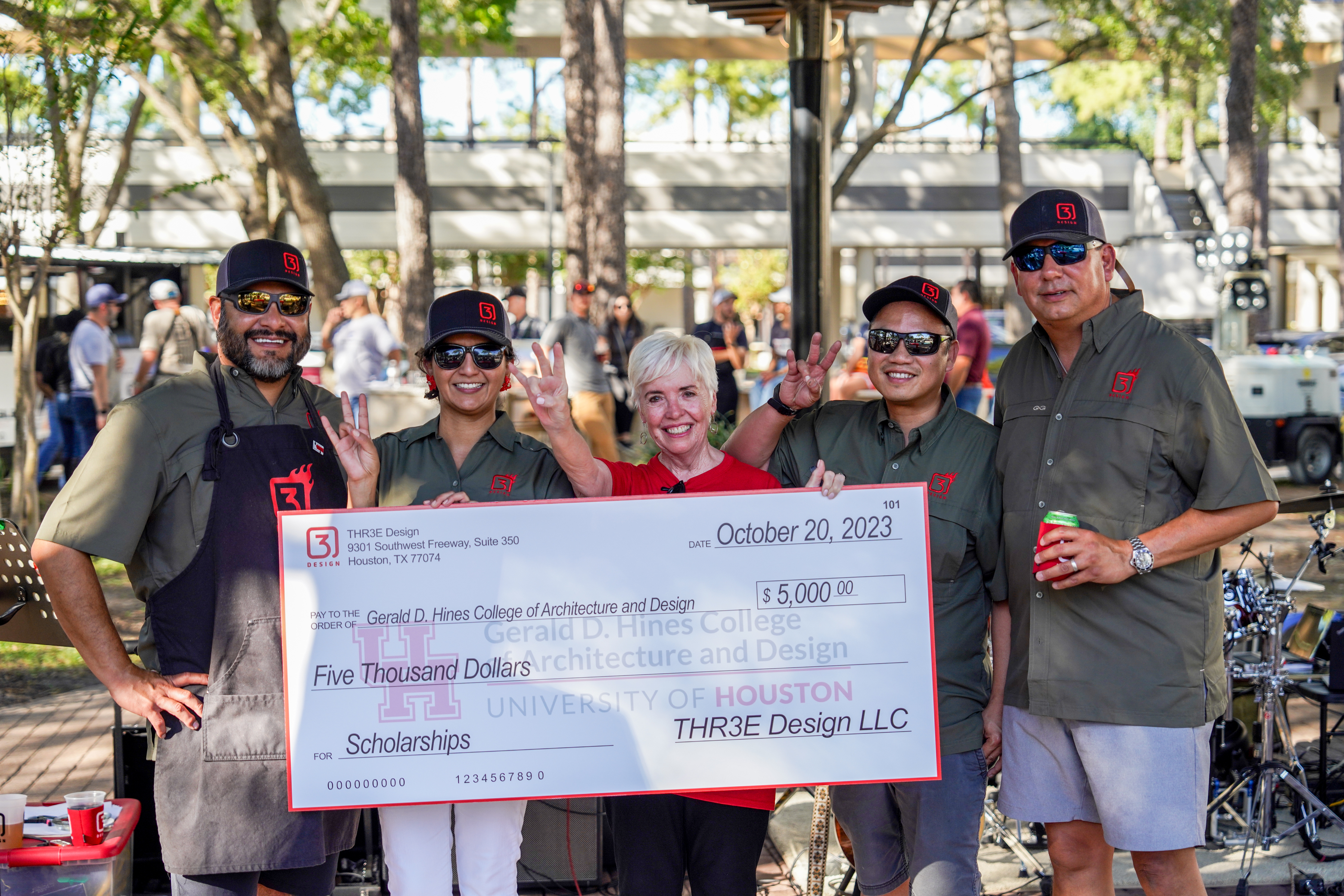 Ruben DeLaO, Jennifer Higgins ('07), Dean Patricia Oliver, Barry Leong ('00), and Frank Marquez.