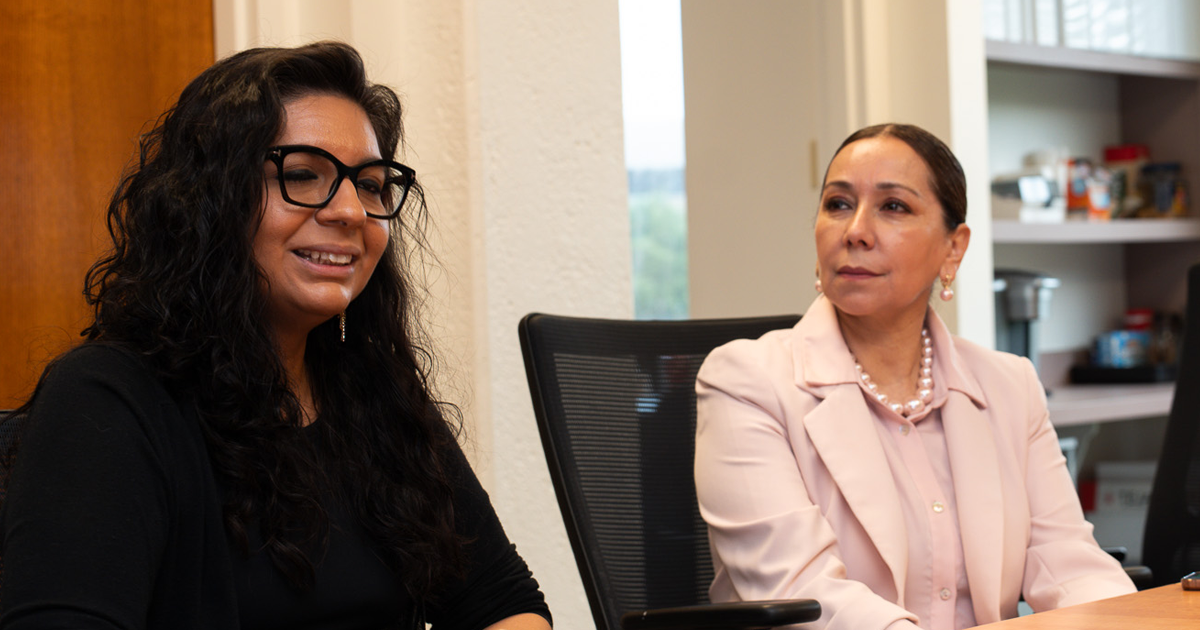 Consul General Orantes sitting with staff from the Center for Mexican American and Latino/a Studies