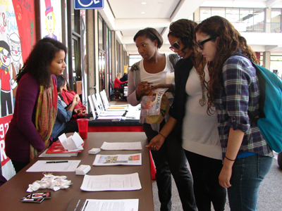 Dance minor Ashley Miles, Business major Ileana Lopez, and Psychology major Jazmin Gomez learn about the Liberal Studies program