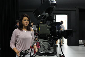 A Valenti School student test drives a new camera 