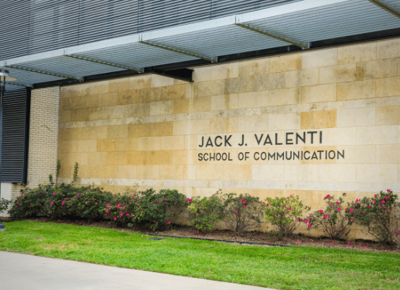 Photo of front of school with words "Jack J. Valenti School of Communication" engraved into wall.