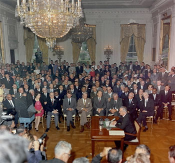 President Johnson signing the Civil Rights Act