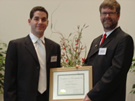 Daniel Wingaurd accepts his award from Dr. Layne
