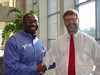 Dr. Layne with the commencement speaker and HHP alumnus, Mr. Lesley Kargbo