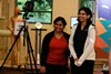 HHP graduate students Mrinali Deo and Pallavi Sharma at the CNBR open house