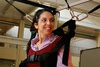 Smiling in the sling: A student at the CNBR open house