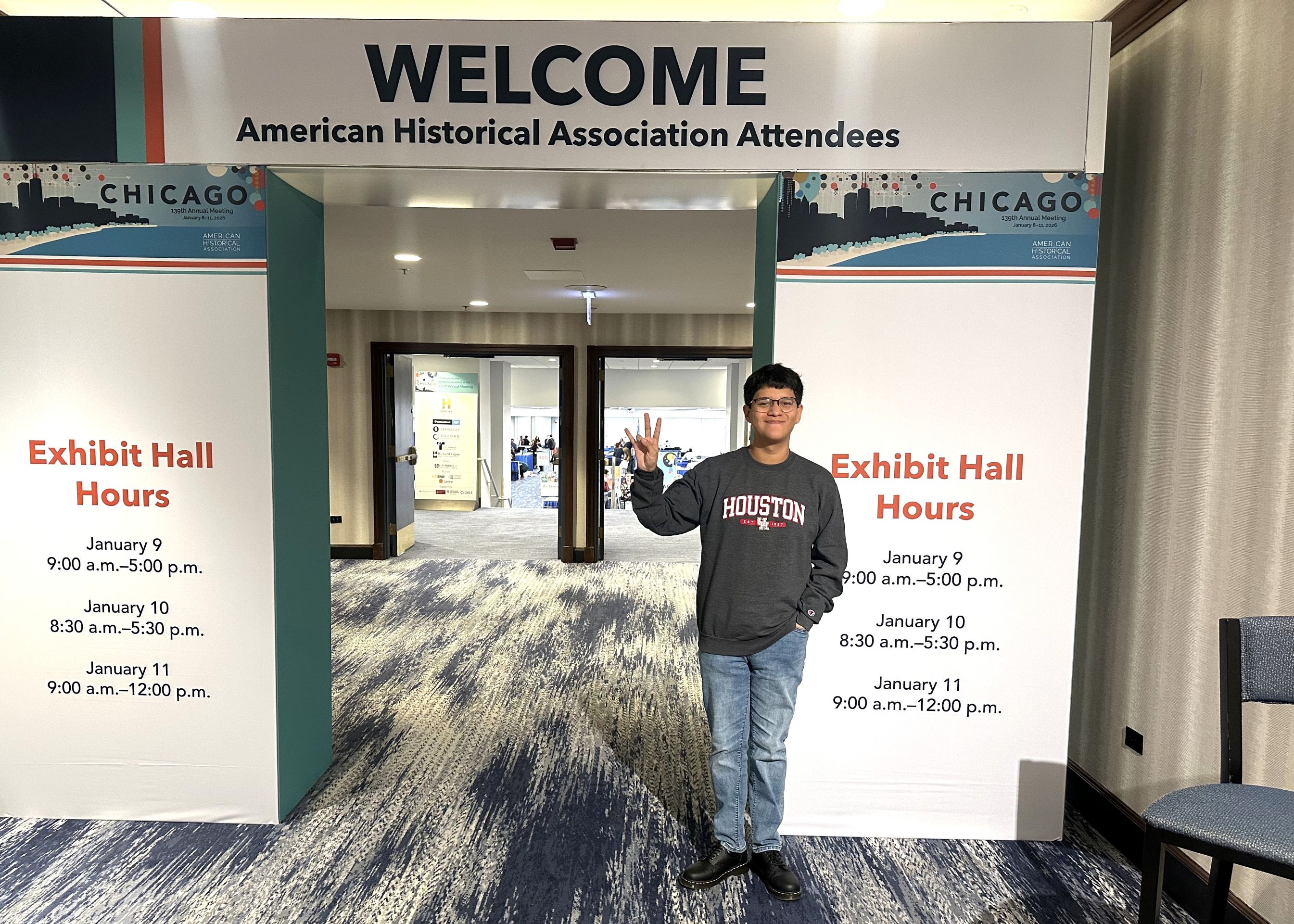 Jorge Polomo at AHA Chicago 2026 A student stands in an exhibition hallway