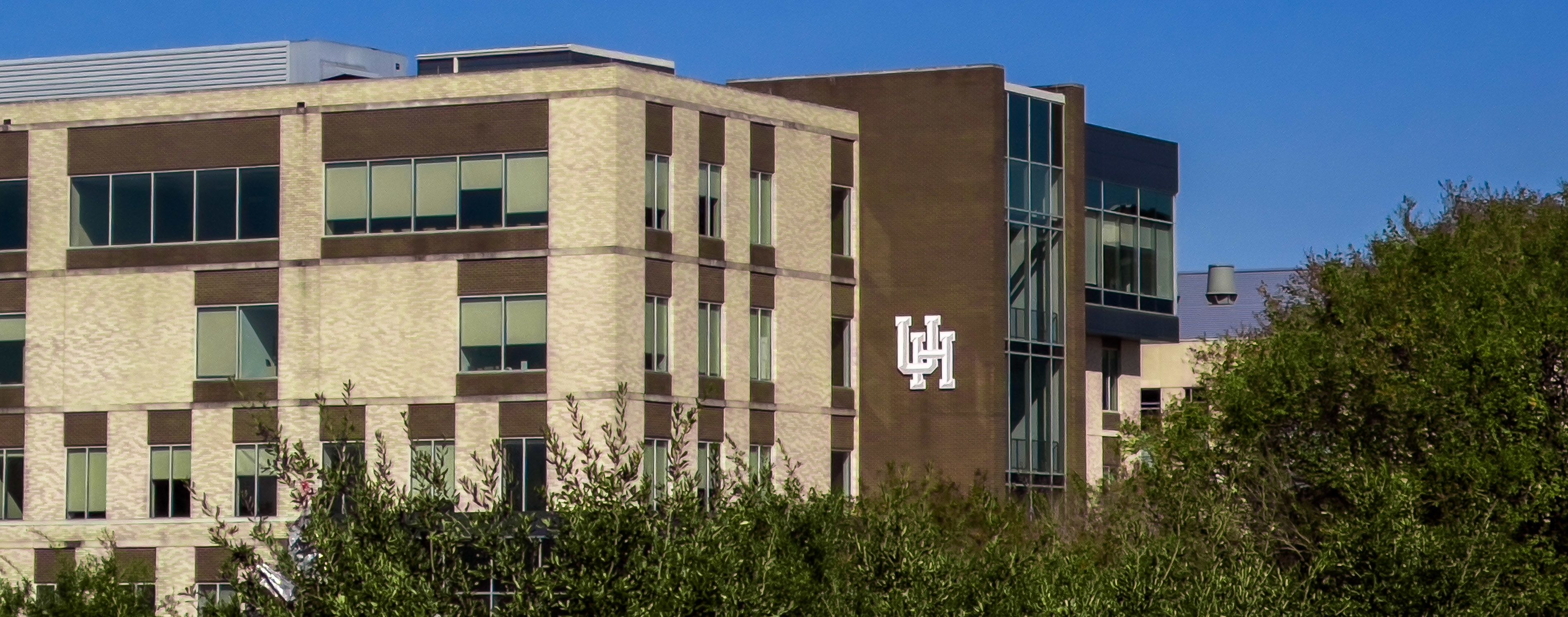 A picture of a building bearing the University of Houston logo