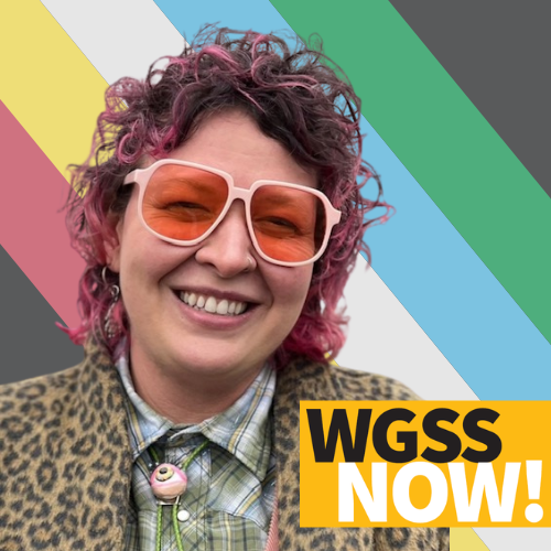 Image of Dr. Jesse Waggoner in front of the disability pride flag.