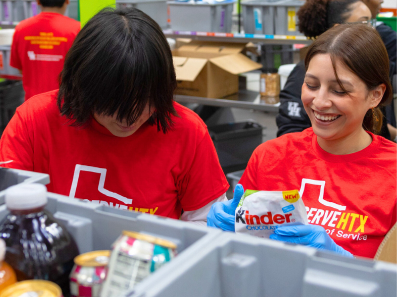 two students volunteering