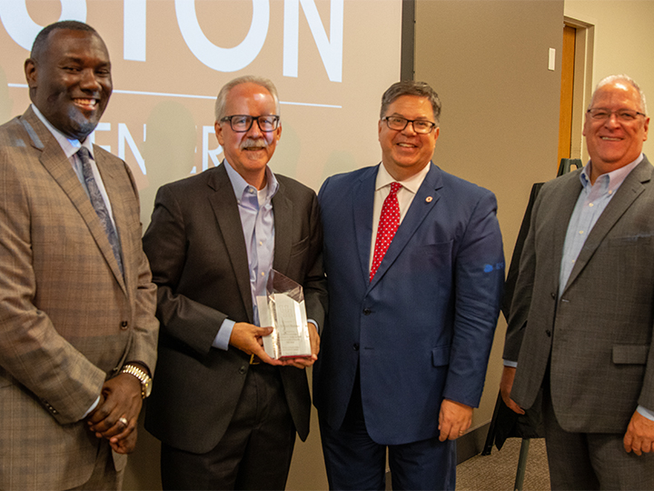 Current Dean of Students Donell Young, Dr. William Munson, interim Vice President for Student Affairs and Enrollment Services Daniel Maxwell, and UH Clear Lake President Richard Walker