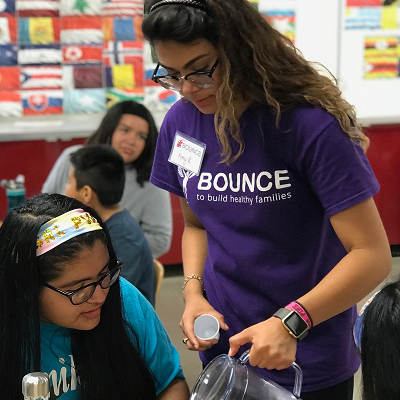 Interns with a student