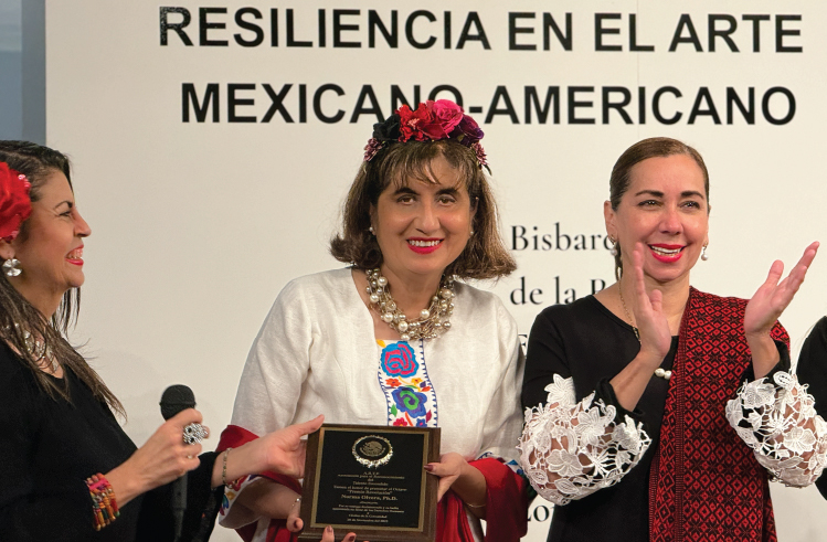 Image of Norma Olvera receiving award 