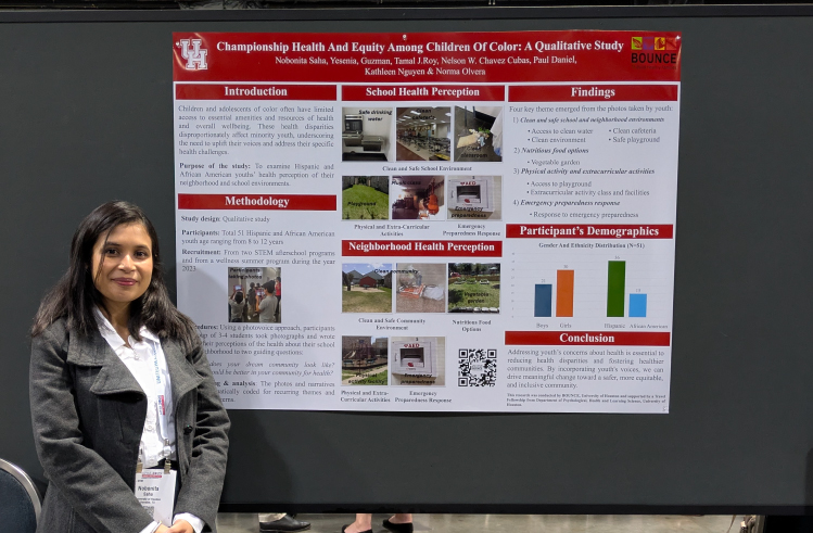 Intern presenting a poster on equity for children of color