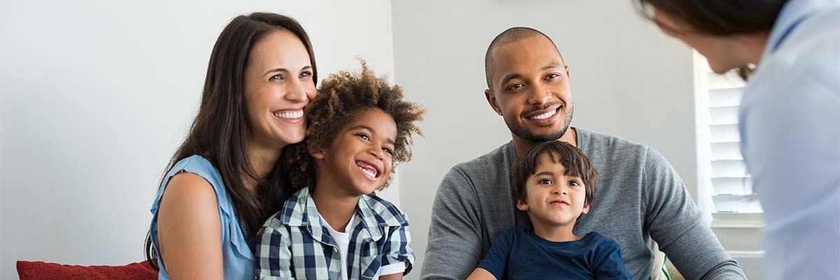 A smiling family.