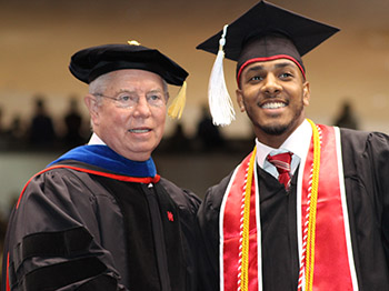 Dean Robert McPherson and COE student Immanuel Peterson at Spring 2016 Graduation