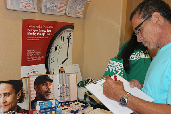 Man signing a paper