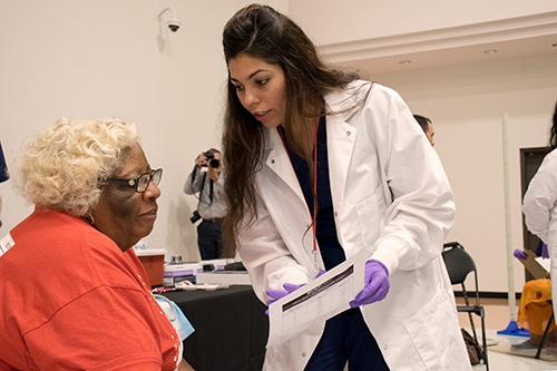 Female patient with health care worker