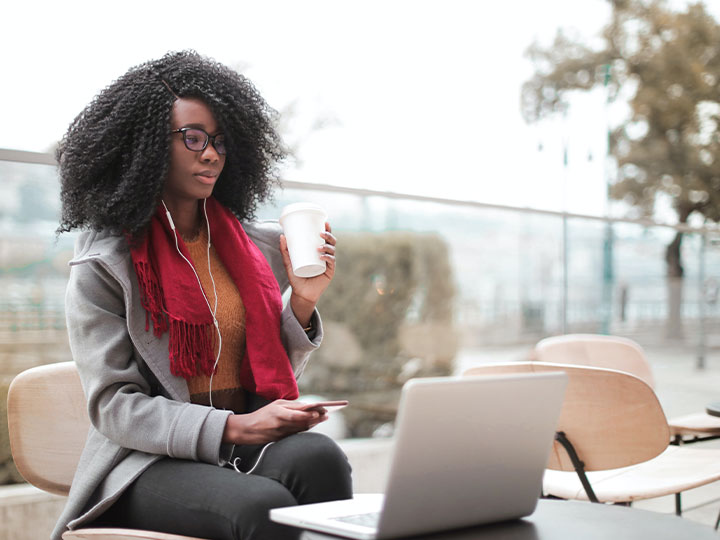 woman sitting with a laptop