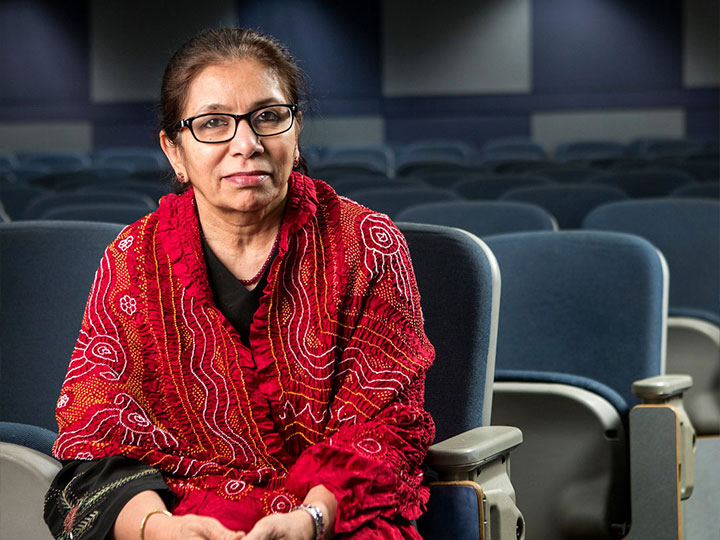 woman sitting facing the camera