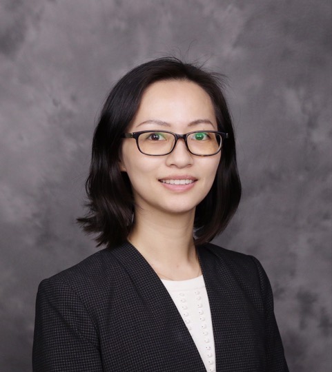 Asian women in a black jacket and white shirt