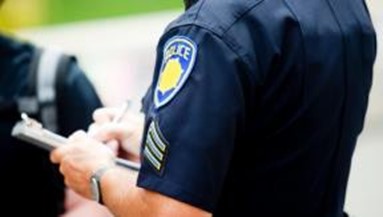 Police officer writing a ticket