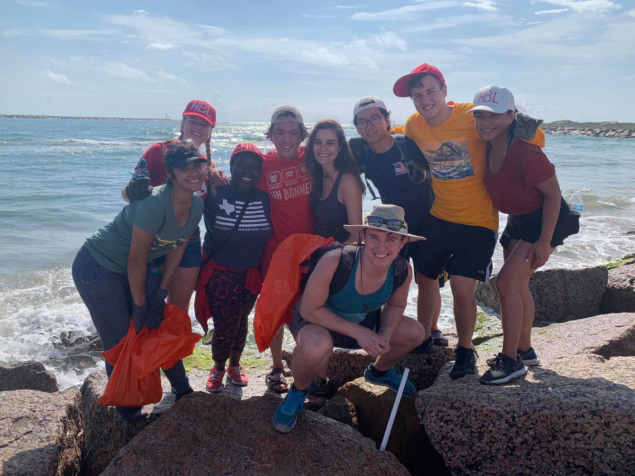 students at beach cleanup