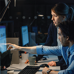 two people looking at a computer screen