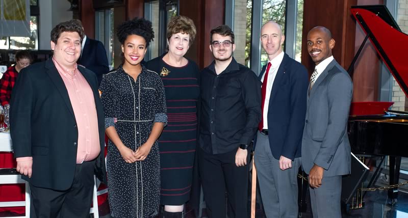 Group photo at a Moores Society event