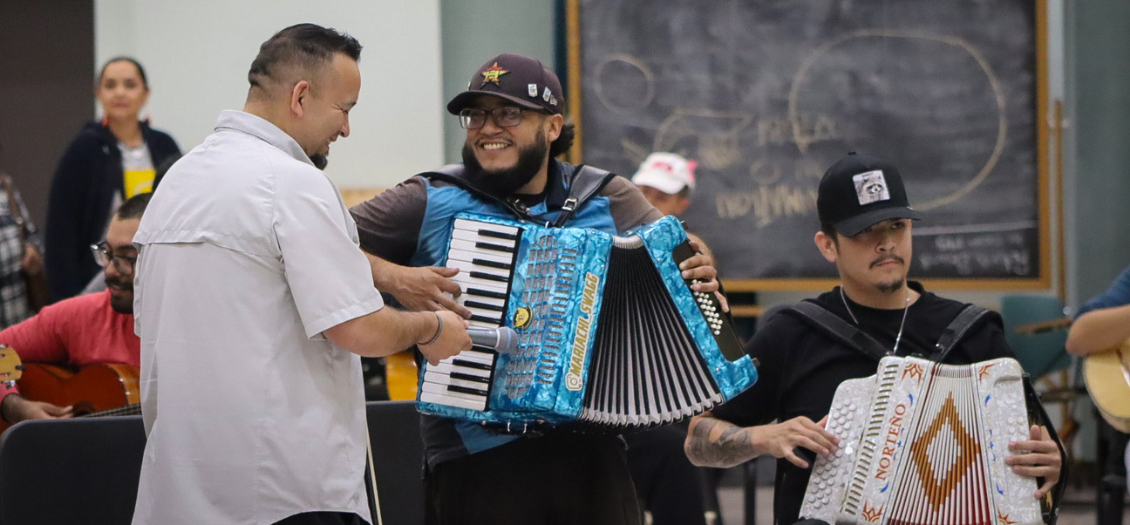 Two accordion players at the 2023 community Mariachi Reunion hosted by the University of Houston Mariachi Pumas