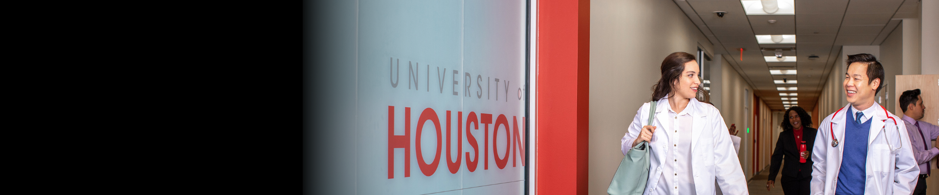 UH student walking up stairs