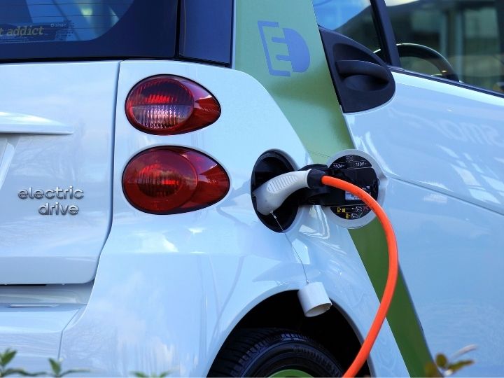 Photo of electric car being charged Photo of electric car being charged