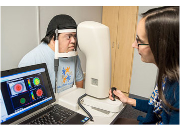 University of Houston optometrist Heather Anderson with patient University of Houston optometrist Heather Anderson with patient