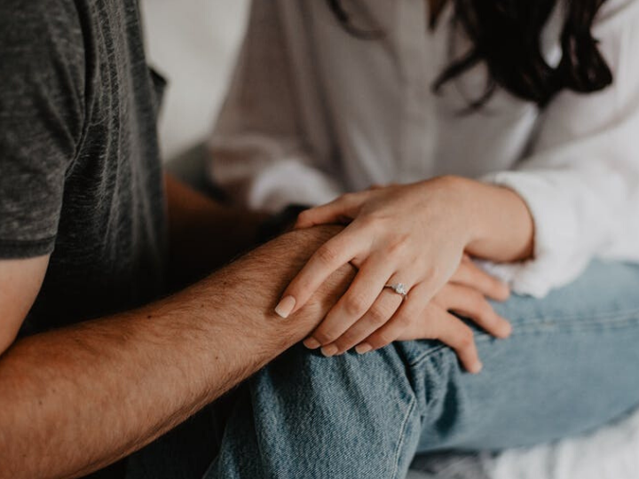 couple with hands on knees